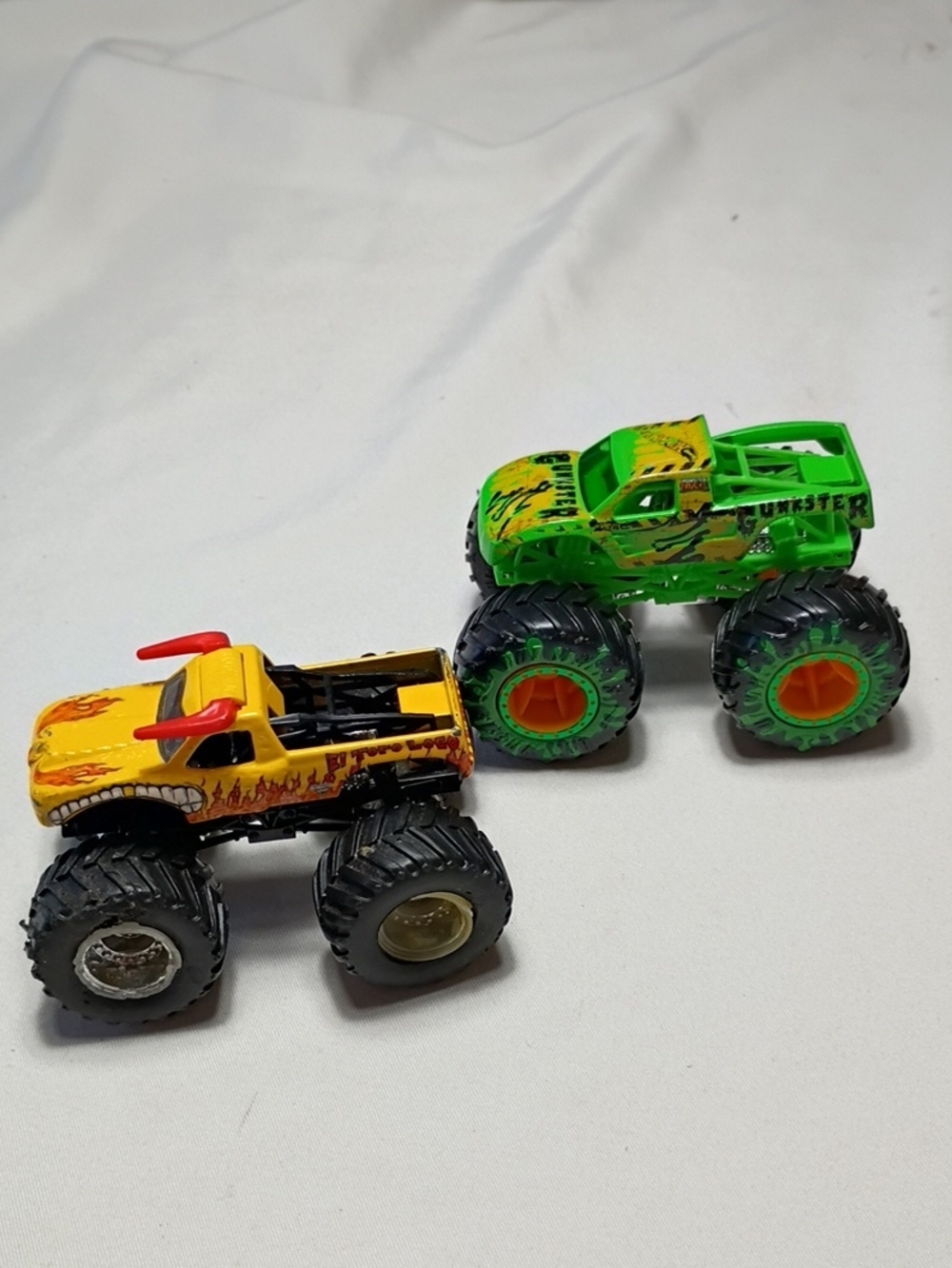 EUC Hot Wheels Monster Jam Set Of 2 El Toro Loco And Gunkster Monster Trucks